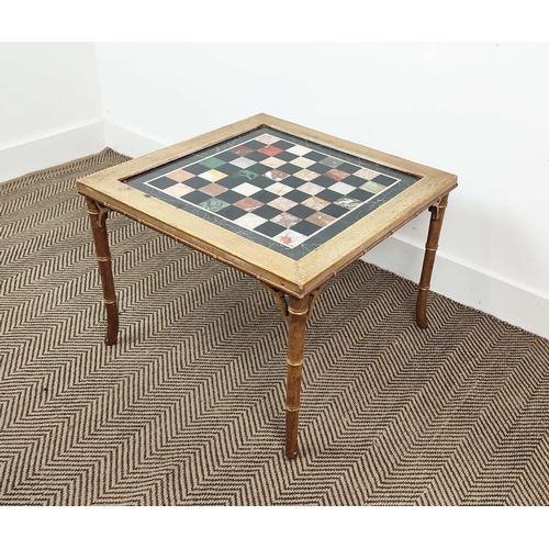 167 - LOW GAMES TABLE, Regency style giltwood and craquelure with inset specimen marble chessboard top on ... 