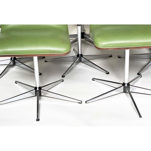 299 - ROBERT HERITAGE CHAIRS, a set of eight, green piped upholstered with veneered curved backs revolving... 