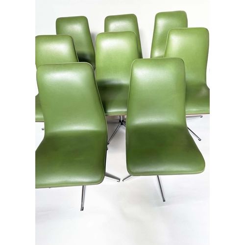 299 - ROBERT HERITAGE CHAIRS, a set of eight, green piped upholstered with veneered curved backs revolving... 