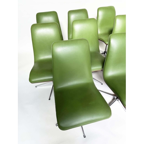 299 - ROBERT HERITAGE CHAIRS, a set of eight, green piped upholstered with veneered curved backs revolving... 