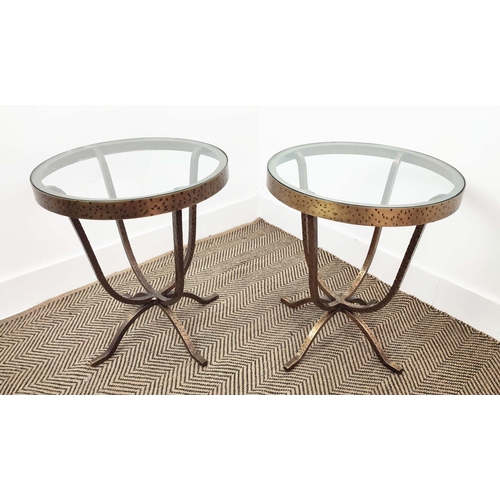 364 - SIDE TABLES, a pair, circular glass tops on hammered metal bases, 52cm H x 45cm. (2)