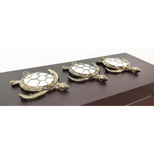 374 - TURTLE WALL MIRRORS, a set of three, gilt finish with segmented mirrored plates, 38cm x 33cm approx.... 