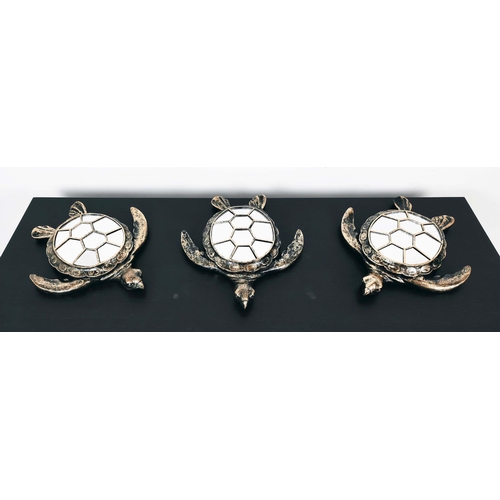 374 - TURTLE WALL MIRRORS, a set of three, gilt finish with segmented mirrored plates, 38cm x 33cm approx.... 