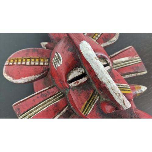 5 - SENUFO MASK, Ivory Coast, red finish. 36cm H.