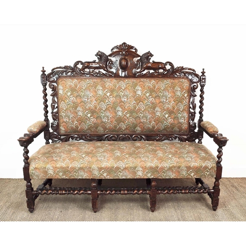 91 - SETTEE, early 20th century Jacobean style oak, with lion carved frame and patterned upholstery, 141c... 