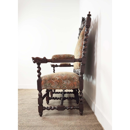 91 - SETTEE, early 20th century Jacobean style oak, with lion carved frame and patterned upholstery, 141c... 