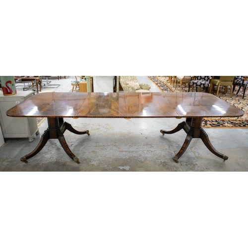 165 - TWIN PEDESTAL DINING TABLE, Regency style mahogany, coromandel and brass mounted with two extra leav... 