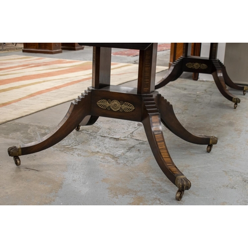 165 - TWIN PEDESTAL DINING TABLE, Regency style mahogany, coromandel and brass mounted with two extra leav... 