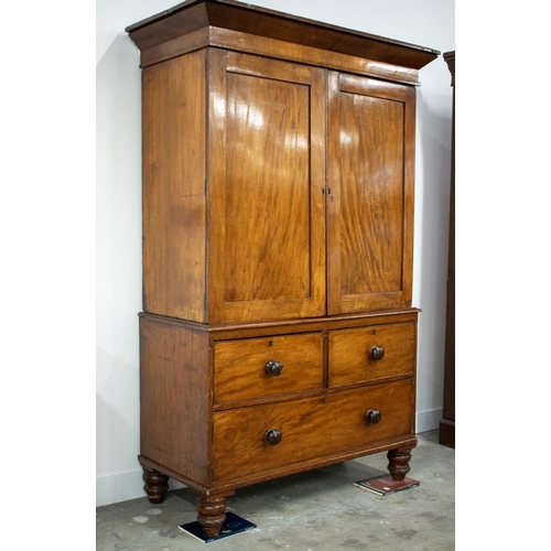 189 - LINEN PRESS, Victorian mahogany with two doors and sliding trays above a base of three drawers, 196c... 