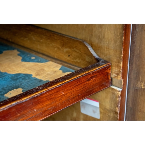 189 - LINEN PRESS, Victorian mahogany with two doors and sliding trays above a base of three drawers, 196c... 