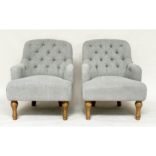 106 - ARMCHAIRS, a pair, early 20th century style with buttoned grey linen upholstery and turned tapering ... 