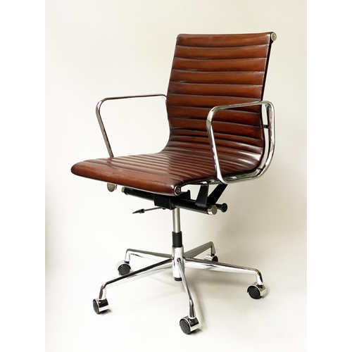 121 - REVOLVING DESK CHAIR, Charles and Ray Eames inspired with hand finished ribbed soft tan brown leathe... 