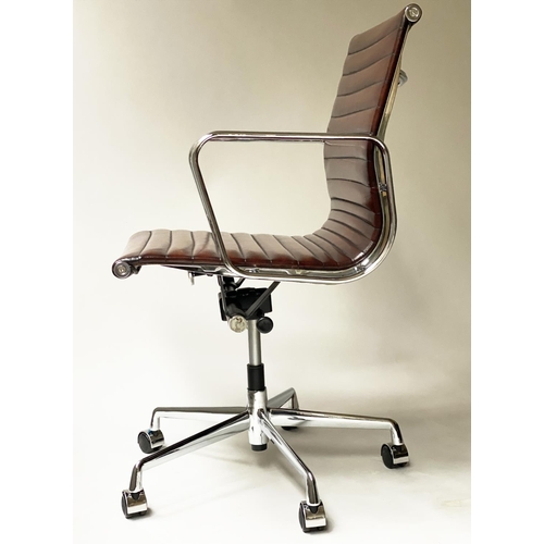 121 - REVOLVING DESK CHAIR, Charles and Ray Eames inspired with hand finished ribbed soft tan brown leathe... 