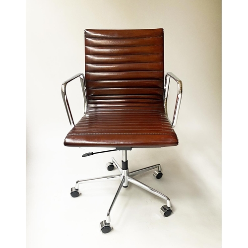 121 - REVOLVING DESK CHAIR, Charles and Ray Eames inspired with hand finished ribbed soft tan brown leathe... 