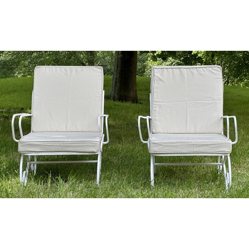 132 - GARDEN TERRACE ARMCHAIRS, a pair, vintage white painted box section metal with cushions on scroll su... 