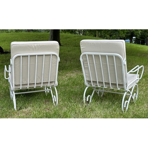 132 - GARDEN TERRACE ARMCHAIRS, a pair, vintage white painted box section metal with cushions on scroll su... 