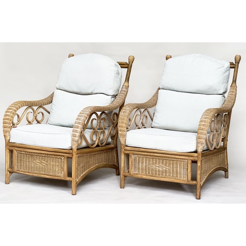 138 - CONSERVATORY ARMCHAIRS, a pair, sun bleached rattan framed wicker panelled and cane bound with round... 