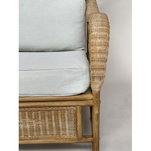 138 - CONSERVATORY ARMCHAIRS, a pair, sun bleached rattan framed wicker panelled and cane bound with round... 