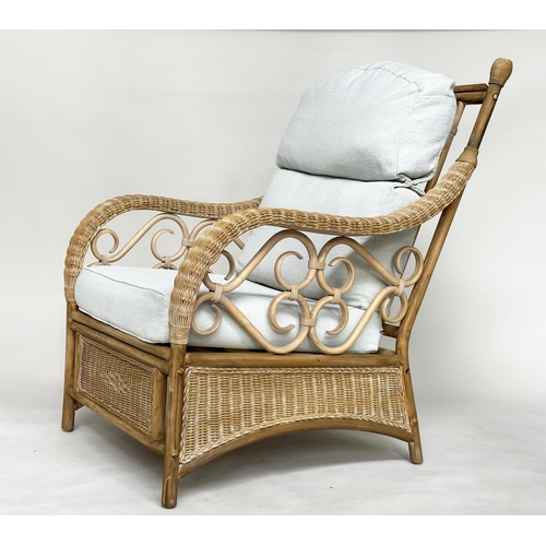 138 - CONSERVATORY ARMCHAIRS, a pair, sun bleached rattan framed wicker panelled and cane bound with round... 