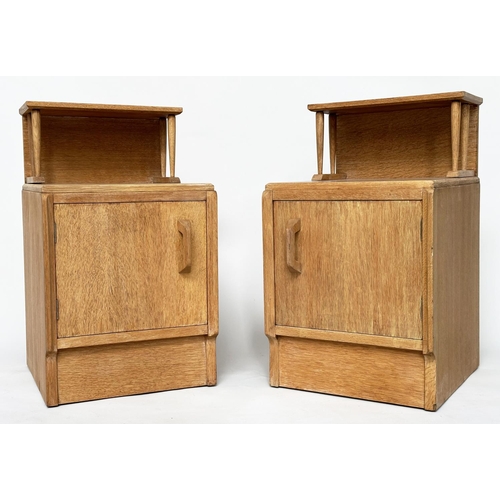 296 - LAMP TABLES BY 'G PLAN', E. Gomme, a pair, mid 20th century oak each with raised shelf and panelled ... 