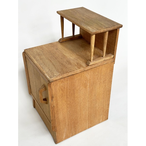 296 - LAMP TABLES BY 'G PLAN', E. Gomme, a pair, mid 20th century oak each with raised shelf and panelled ... 