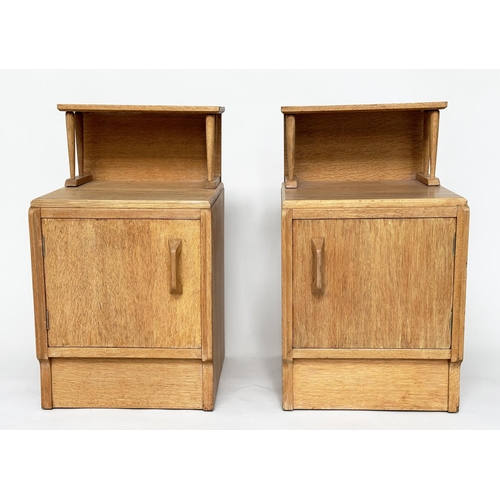 296 - LAMP TABLES BY 'G PLAN', E. Gomme, a pair, mid 20th century oak each with raised shelf and panelled ... 