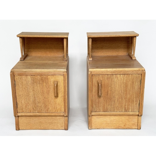 296 - LAMP TABLES BY 'G PLAN', E. Gomme, a pair, mid 20th century oak each with raised shelf and panelled ... 