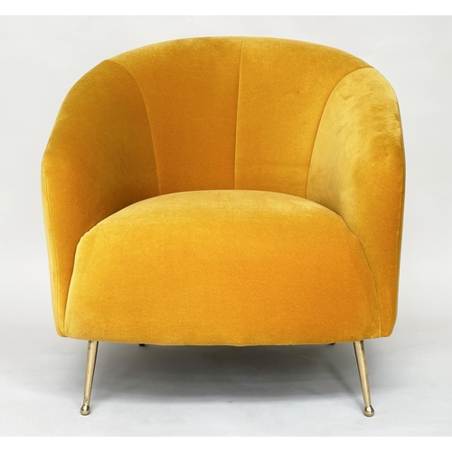 298 - HEAL'S ARMCHAIR, yellow velvet upholstered with curved back and tapering gilt metal supports, labell... 