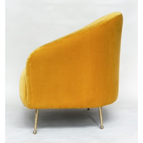 298 - HEAL'S ARMCHAIR, yellow velvet upholstered with curved back and tapering gilt metal supports, labell... 