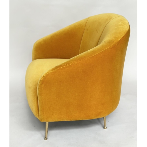 298 - HEAL'S ARMCHAIR, yellow velvet upholstered with curved back and tapering gilt metal supports, labell... 