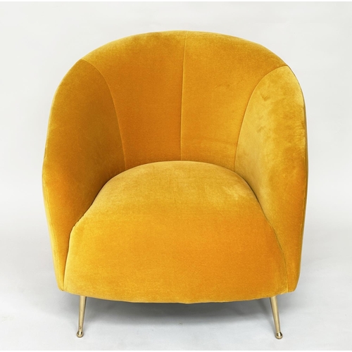 298 - HEAL'S ARMCHAIR, yellow velvet upholstered with curved back and tapering gilt metal supports, labell... 