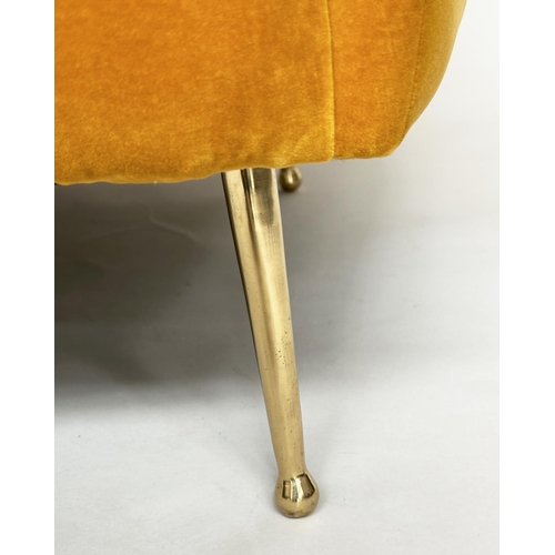 298 - HEAL'S ARMCHAIR, yellow velvet upholstered with curved back and tapering gilt metal supports, labell... 