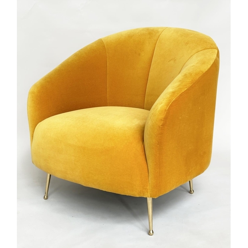 298 - HEAL'S ARMCHAIR, yellow velvet upholstered with curved back and tapering gilt metal supports, labell... 