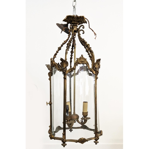 182 - HALL LANTERN, with a brass frame and shaped glazing, 80cm tall.