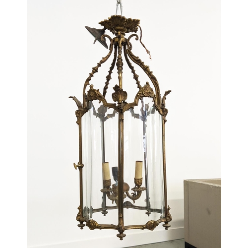 182 - HALL LANTERN, with a brass frame and shaped glazing, 80cm tall.