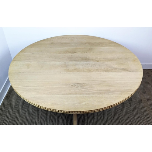 370 - BREAKFAST TABLE, oak circular top with carved detail to side on an outswept quadraform base, 150cm W... 