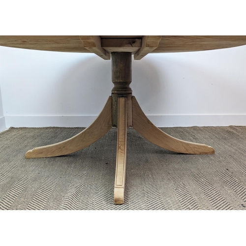 370 - BREAKFAST TABLE, oak circular top with carved detail to side on an outswept quadraform base, 150cm W... 