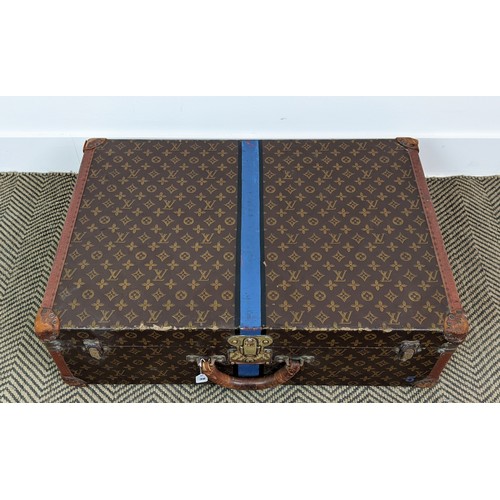 39 - LOUIS VUITTON VINTAGE HARD SUITCASE, monogrammed with leather handles and trims with decorative blue... 