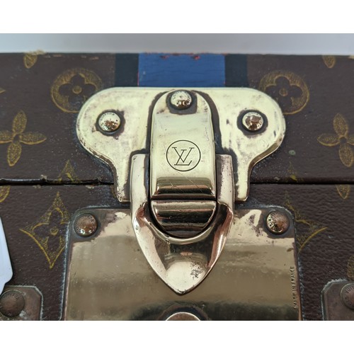 39 - LOUIS VUITTON VINTAGE HARD SUITCASE, monogrammed with leather handles and trims with decorative blue... 