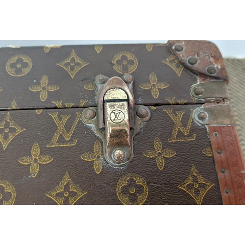 39 - LOUIS VUITTON VINTAGE HARD SUITCASE, monogrammed with leather handles and trims with decorative blue... 