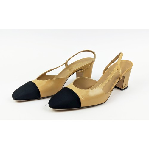 83 - CHANEL SLINGBACK SHOES, beige goatskin leather with black grosgrain toe, iconic CC logo in gold tone... 