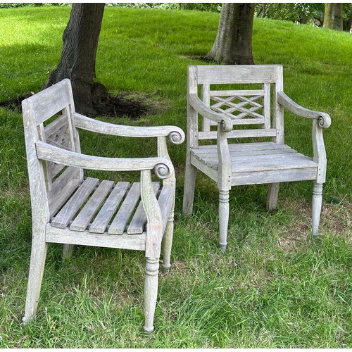 129 - COLONIAL STYLE GARDEN ARMCHAIRS, a pair, nicely weathered high grade teak each with pierced trellis ... 