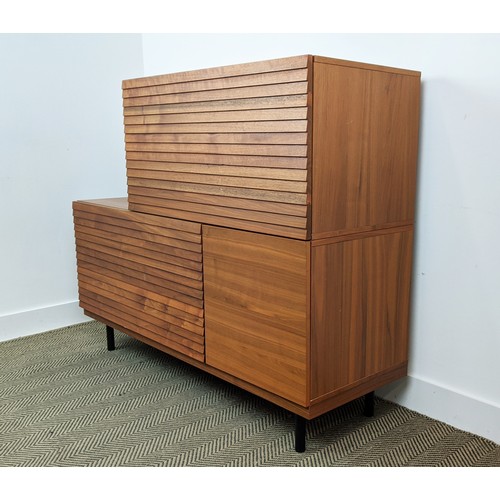 368 - CABINET, with three ribbed doors, 135cm W x 110cm H x 47cm D.