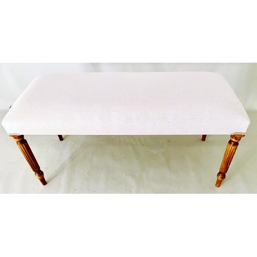 340 - FOOTSTOOL, neutral linen upholstery on reeded supports, 48cm H x 98cm L x 40cm W