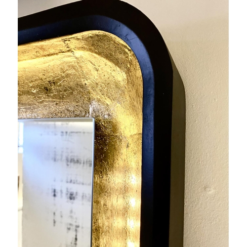 351 - WALL MIRROR, black and gilt frame with light to detail, 180cm H x 60cm W.