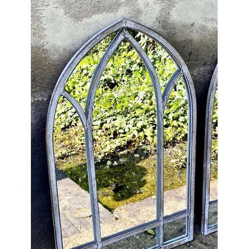 352 - ARCHITECTURAL GARDEN MIRRORS, a set of four, arched metal frames, 60cm H x 38cm W. (4)