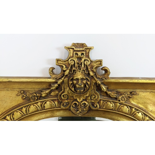 154 - WALL MIRROR, Napoleon III style gilt framed with lion crest and arched bevelled plate, 136cm H x 81c... 