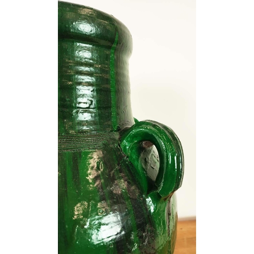 420 - GARDEN URNS, a pair, green glazed terracotta, 58cm H x 35cm W. (2)