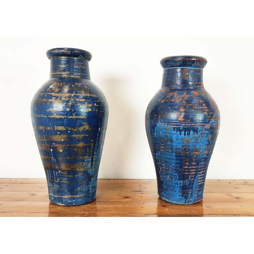 421 - GARDEN URNS, a pair, blue glazed terracotta, 61cm H x 28cm D. (2)