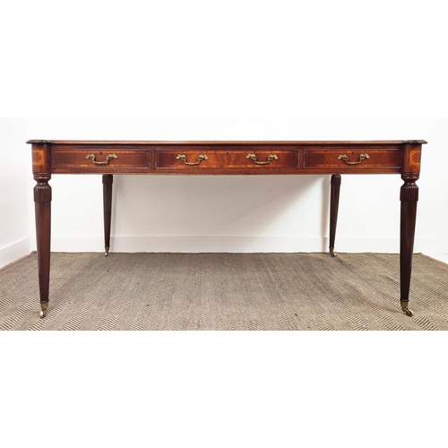 216 - PARTNER'S WRITING TABLE, Regency style mahogany and crossbanded with brown leather top above three d... 